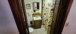 Master bathroom with a shower/tub combo.